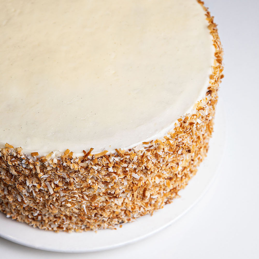 The Ultimate Coconut Cake on a table